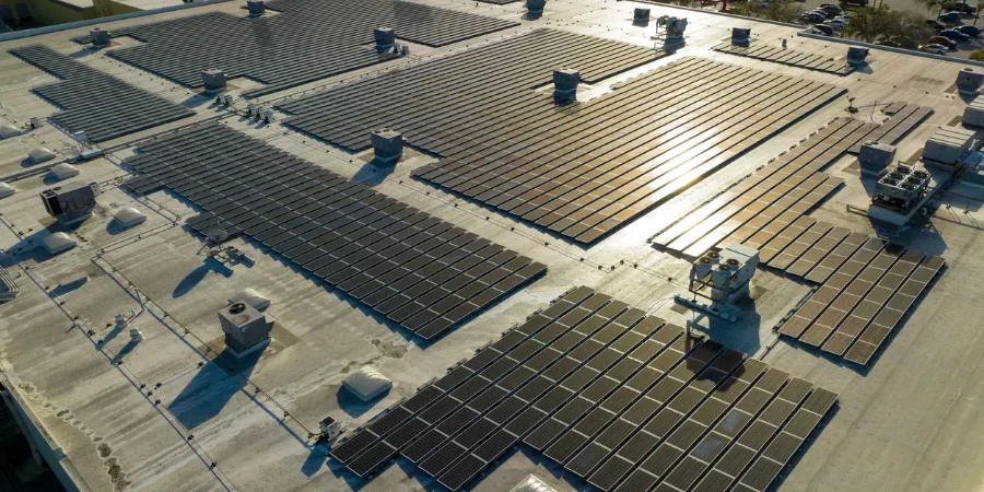 Photovoltaic solar panels mounted on industrial building roof