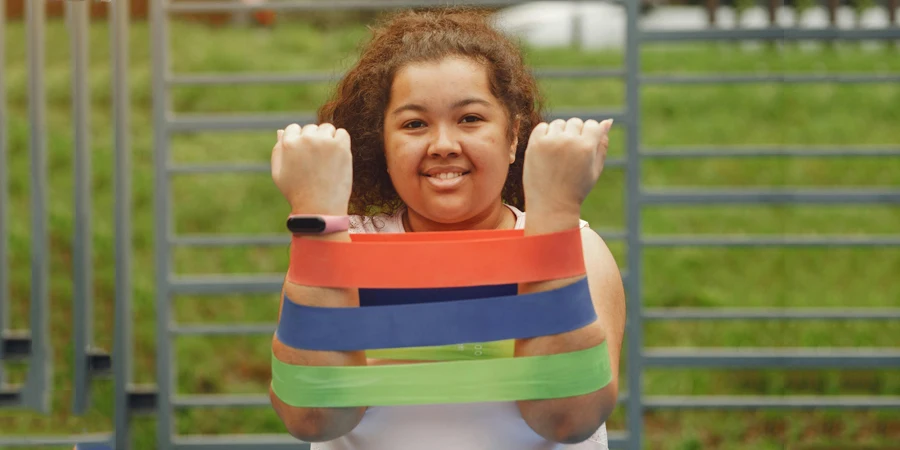 Portrait of Happy Woman with Fitness Bands