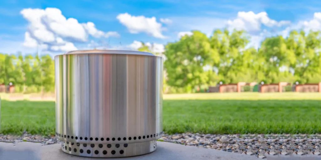 Smokeless stainless steel fire pit in a residential backyard