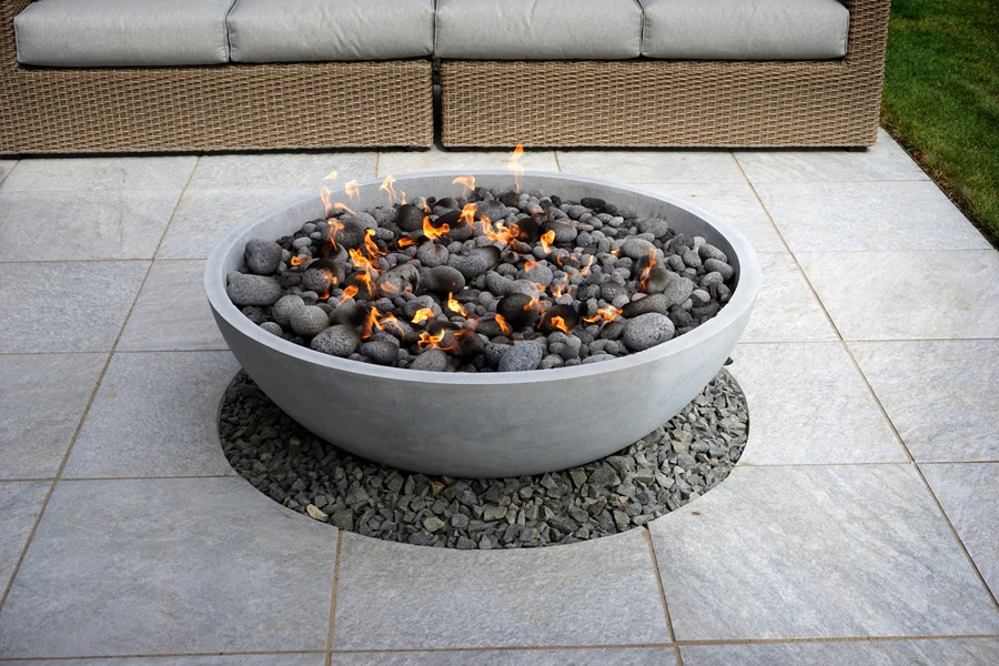 Smokeless stainless steel fire pit on a patio