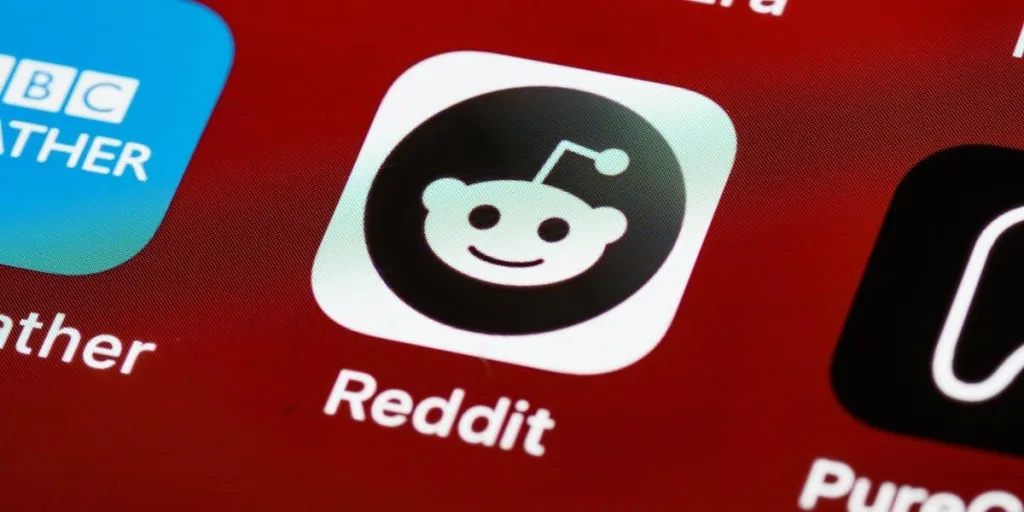 The Reddit app logo on a red background