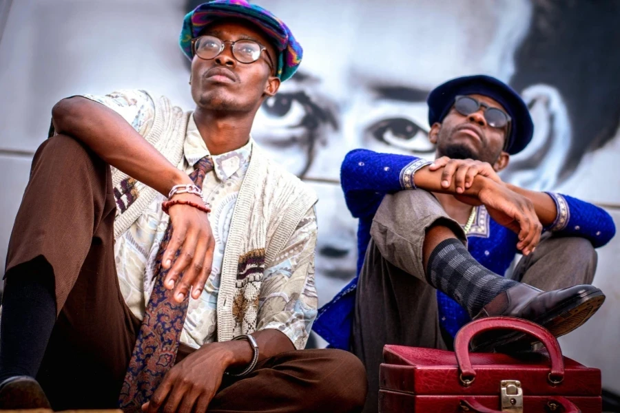 Two Men Sitting Looking Up