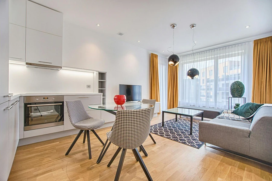 Two chairs with a glass table in a modern living room