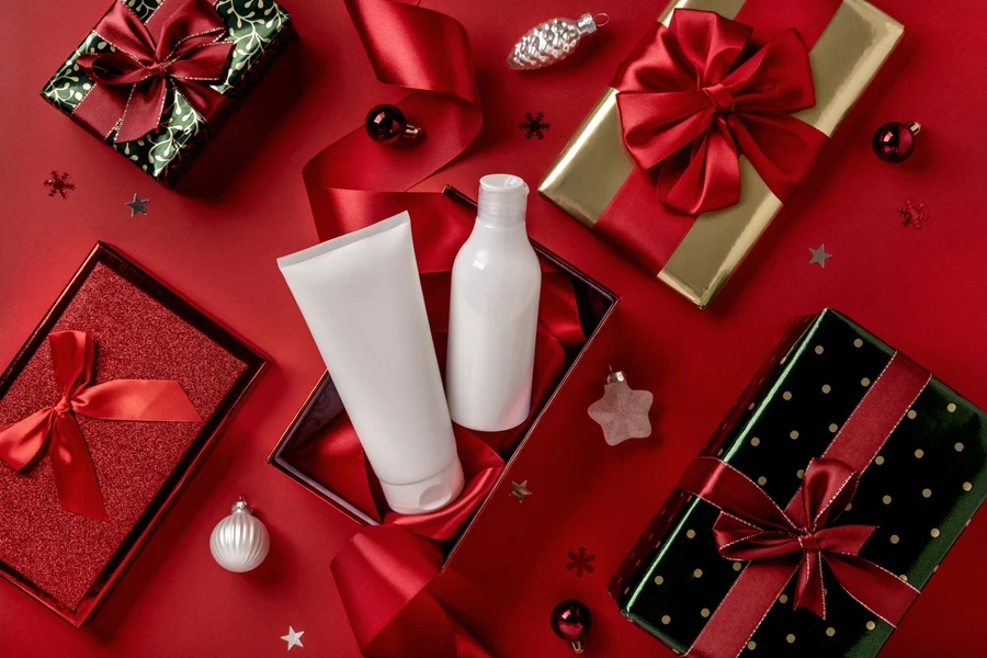 White cosmetics bottle in red gift box