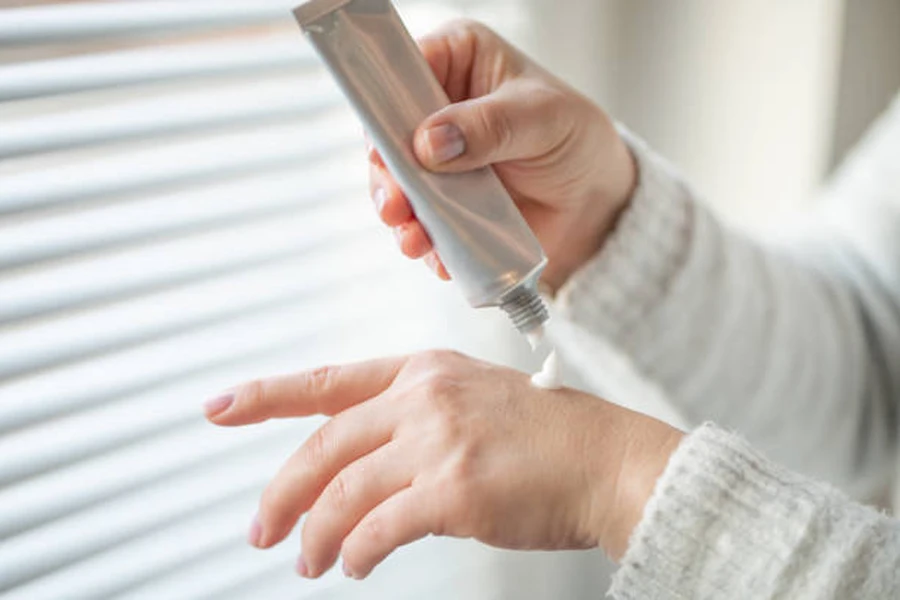 Woman Applying Hand Cream