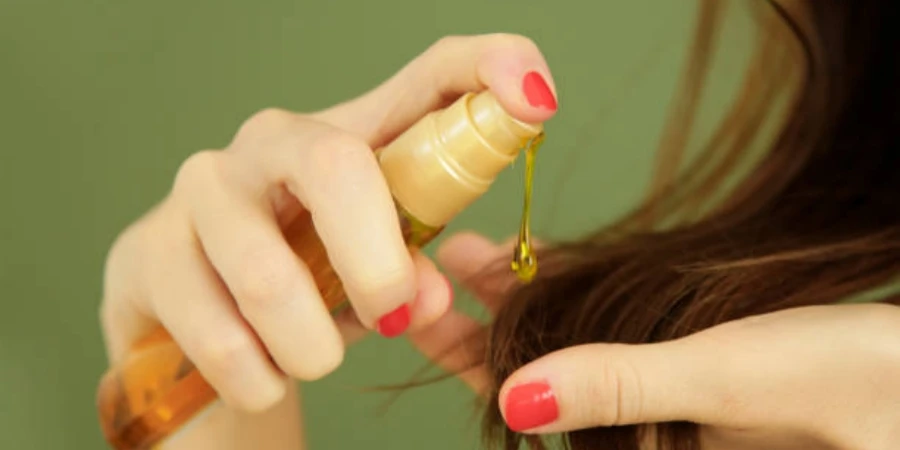 Woman Applying Oil on Hair Ends