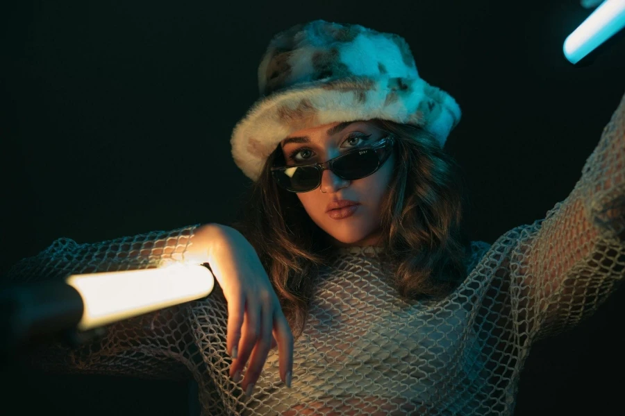 Woman Posing in a Fluffy Hat