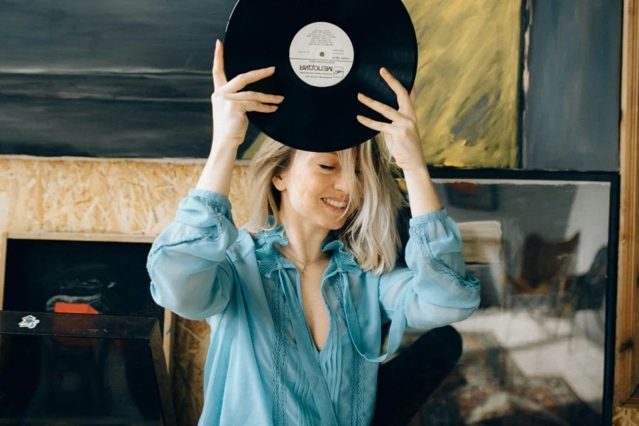 Woman holding record