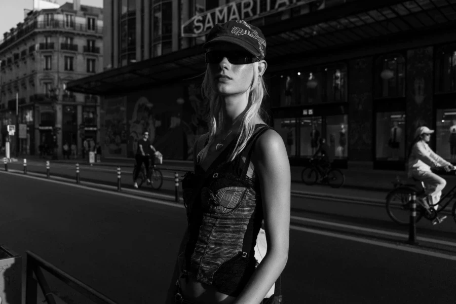 Woman in Camisole Standing on Street