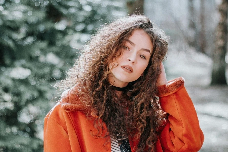 Woman in Orange Zip-up Jacket