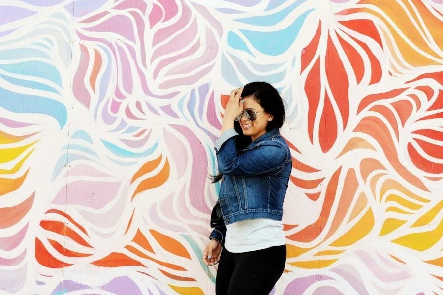 Woman in a blue cropped denim jacket