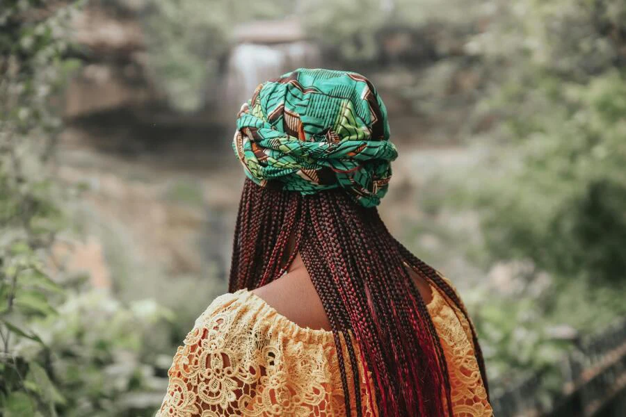 Woman in a green braid wrap