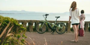 Women and Electric Cargo Bike on Promenade