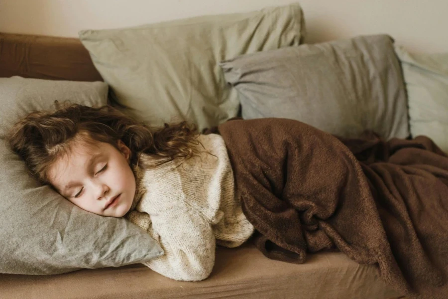 Young Girl sleeping in a Sofa