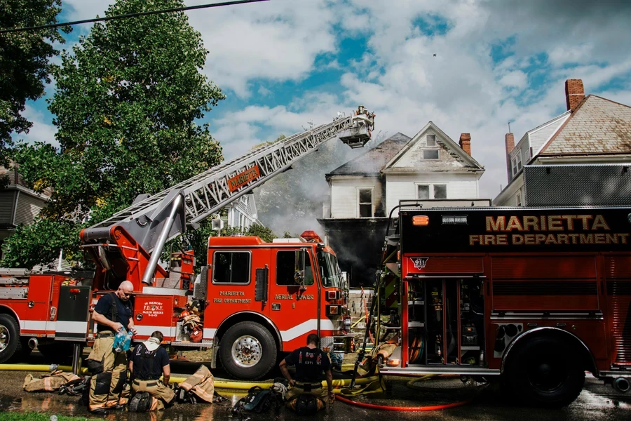 a couple of fire trucks parked next to each other