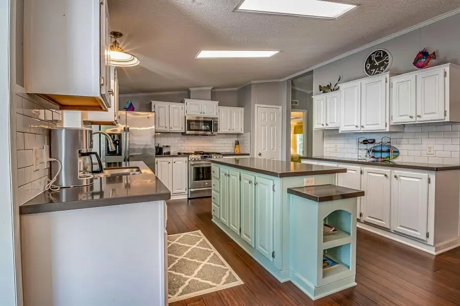 A kitchen with a kitchen mat