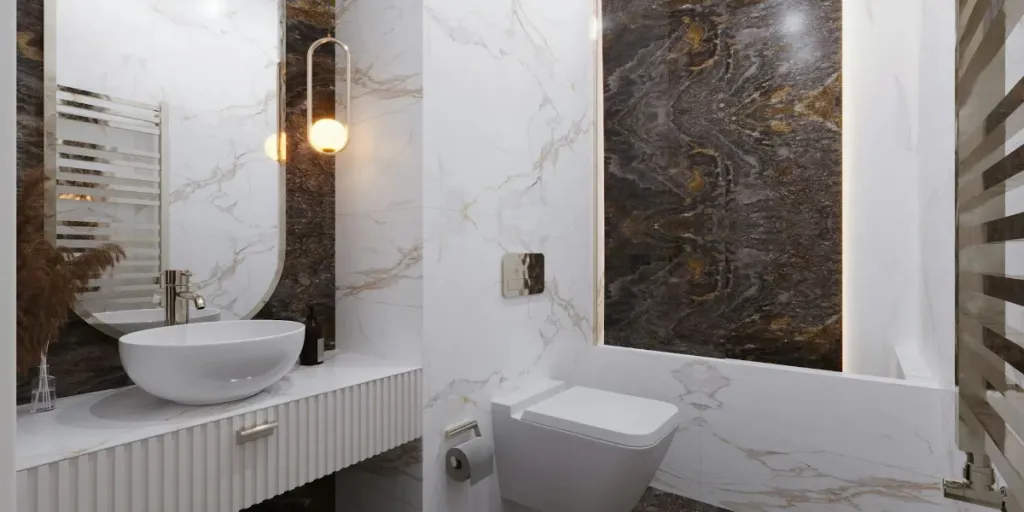 Bathroom with marble tiles, a tub sink and toilet