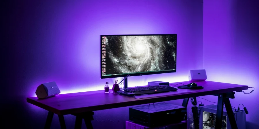 flat screen computer monitor on brown computer desk