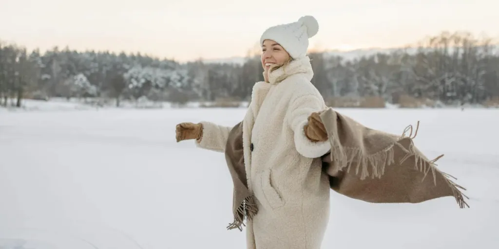 Lady in women’s wool coat on a sunny winter day