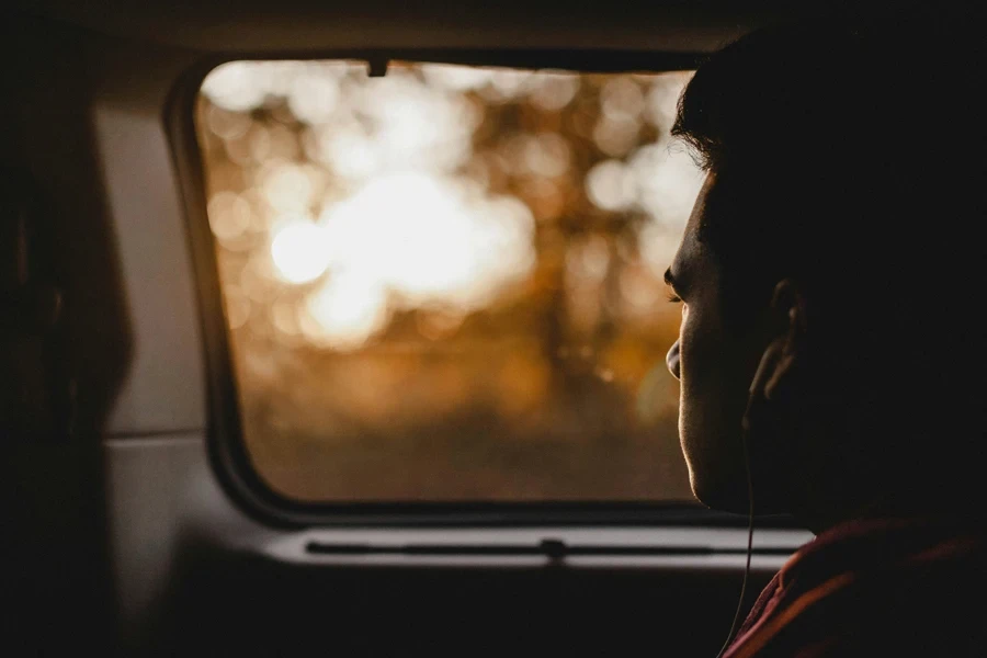 man sitting inside vehicle