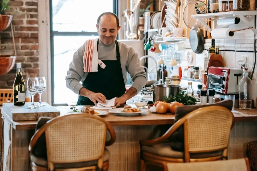 Smiling man cooking pasta