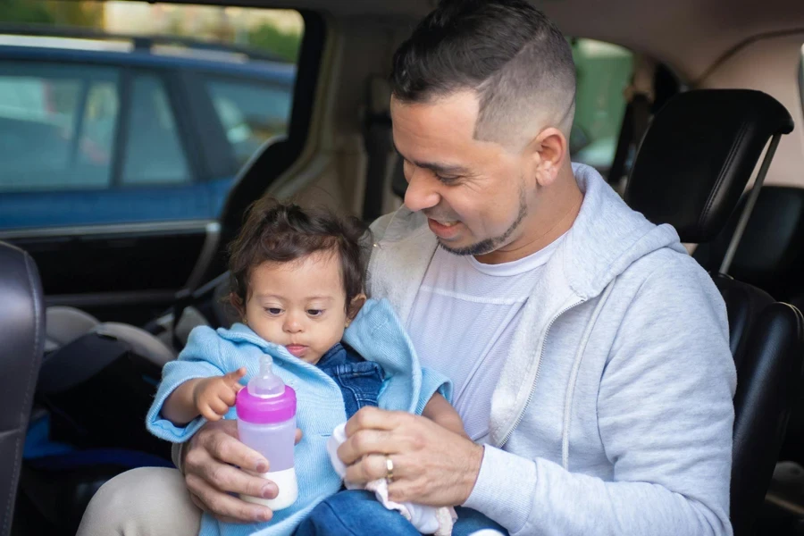 A Father with His Child inside a Car