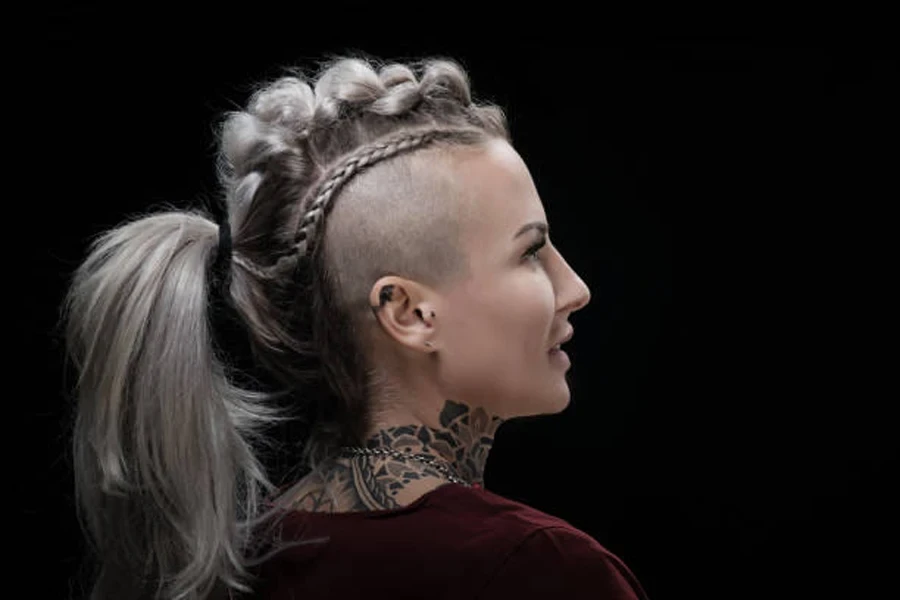 A Tattooed Viking Blonde Female and Her Unique Hairstyle