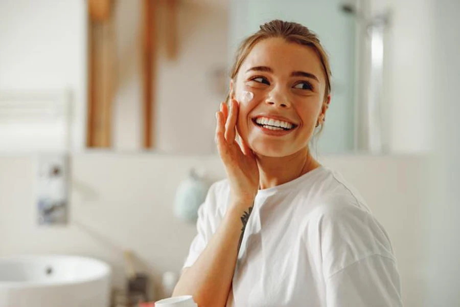 A Young Beautiful Woman Taking Care of Her Skin