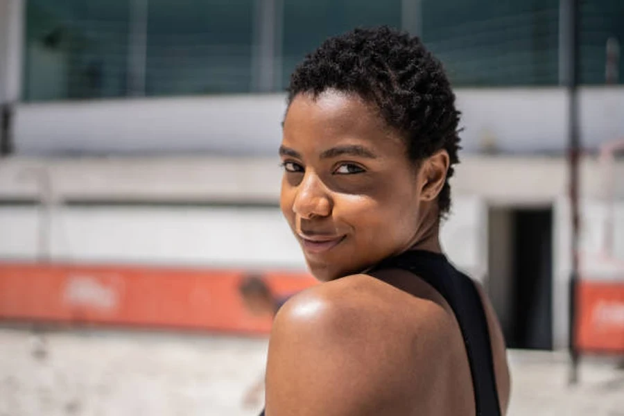 A Young Woman in a Beach Tennis Court