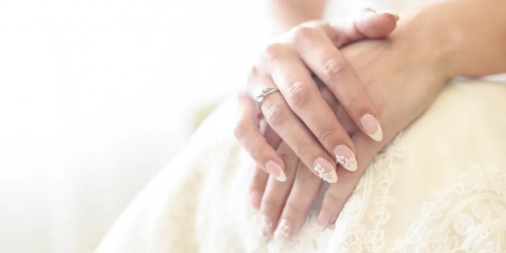 A bride with beautiful wedding nails