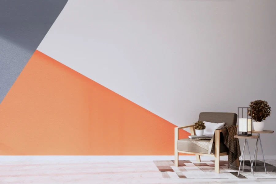 A gray and orange wall with geometric accent