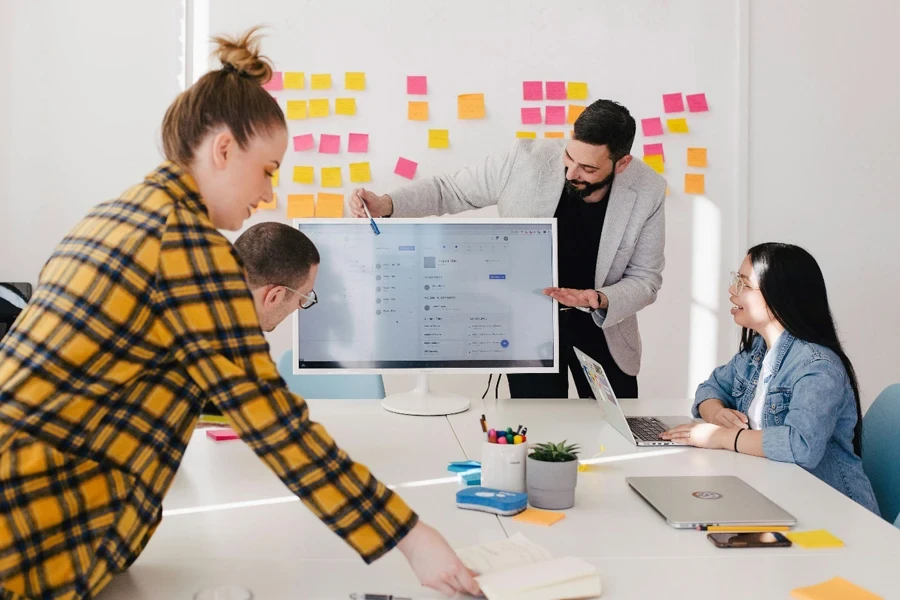 A group of people in a meeting