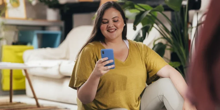 A plus-size woman using her smartphone