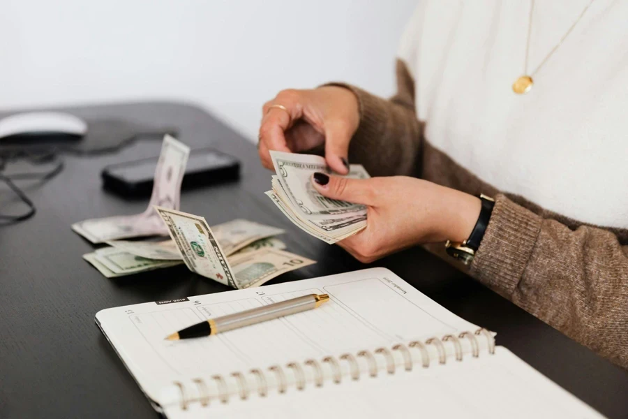 A woman counting cash money