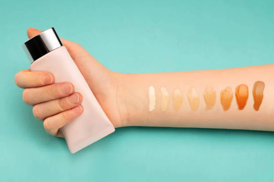 Arm with different shades of tinted moisturizer in a row