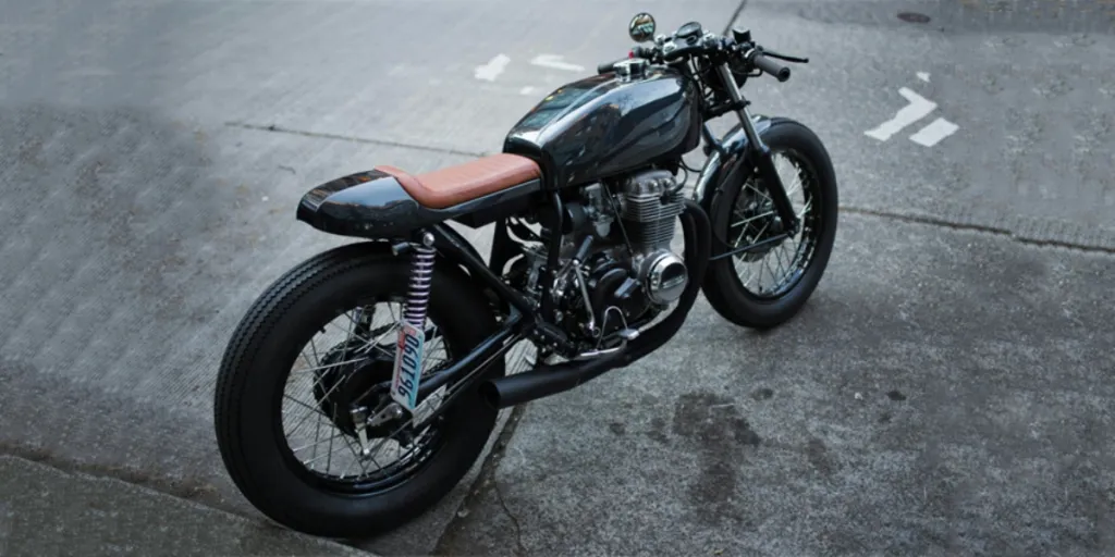 Black cruiser motorcycle on a paved road