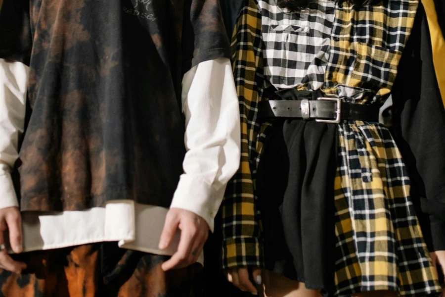 Close-Up Shot of Two People Wearing Stylish Outfits