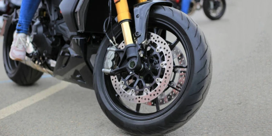 Front wheel of a modern motorcycle close-up