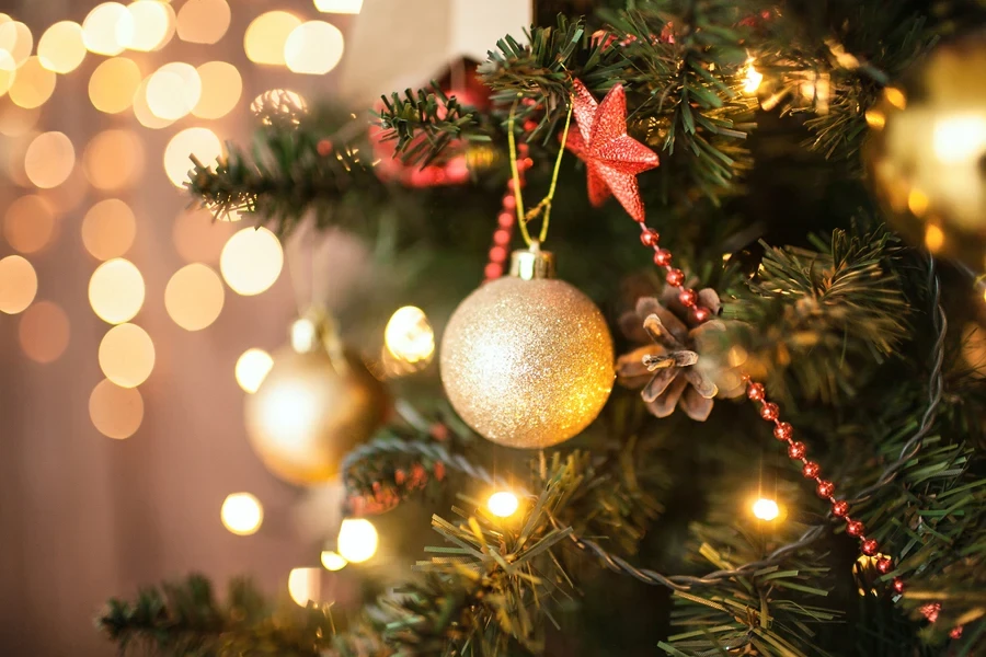 Gold and red decorations on a Christmas tree