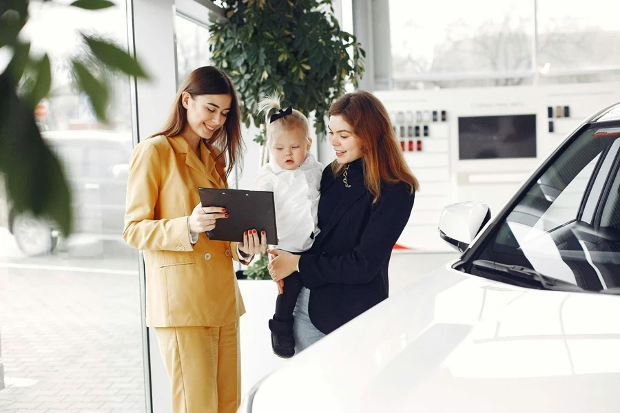 Happy Mother Looking at Contract