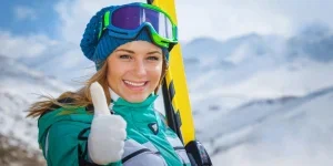 Happy Woman Enjoying Ski Resort