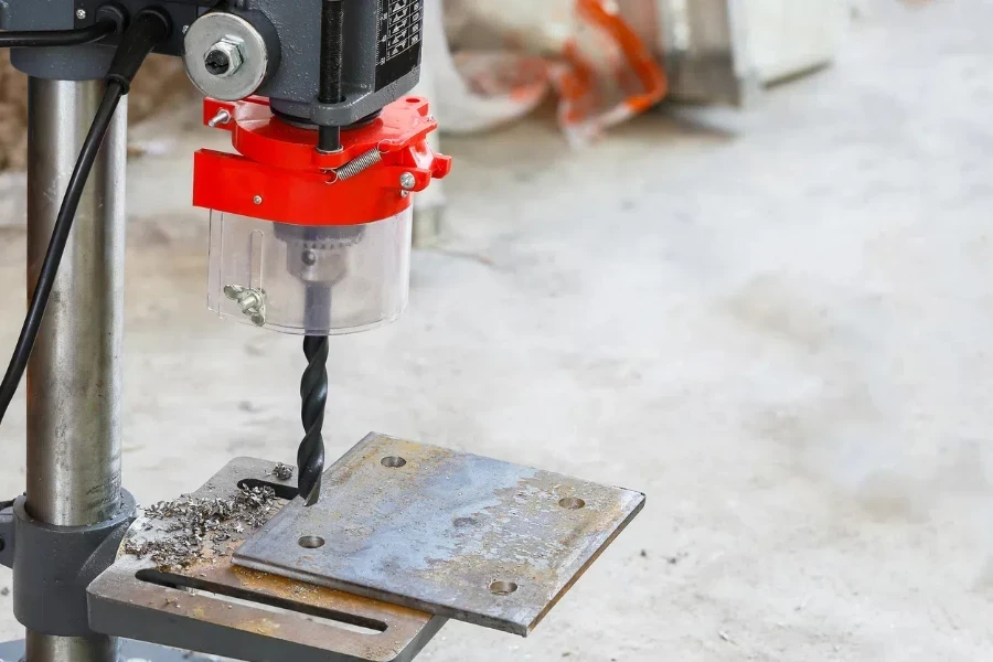 Industrial Iron drill in action in workshop