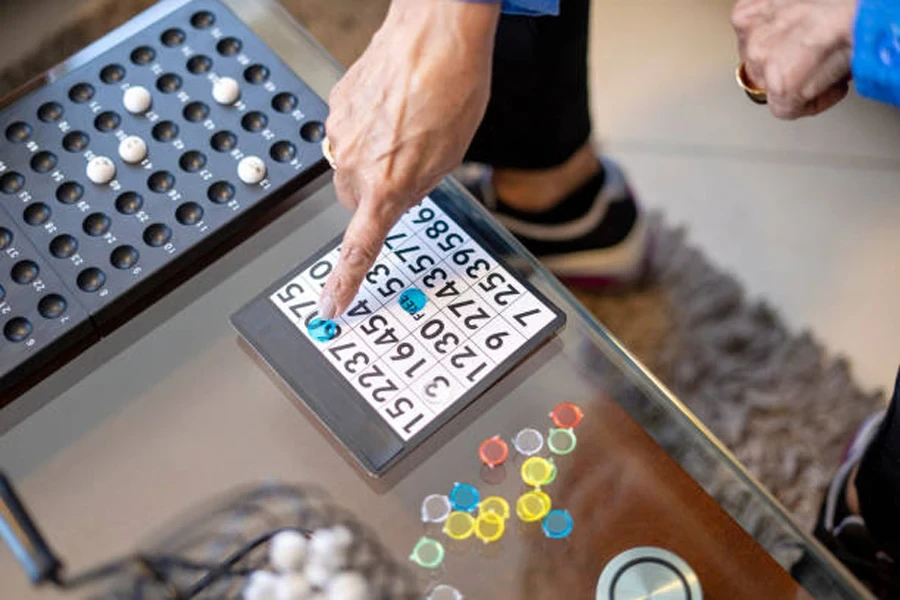 Modern version of bingo board game on coffee table