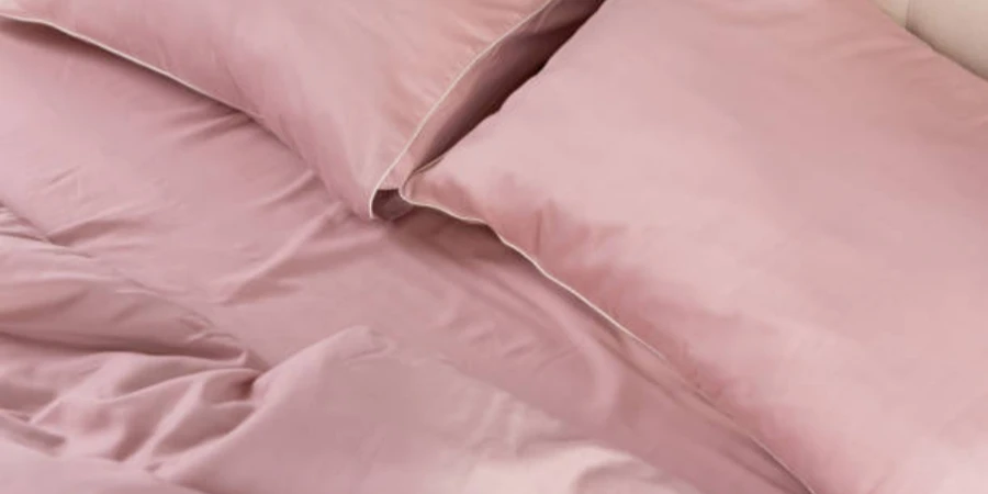 Pale Pink Satin Bed Linen and Pillows