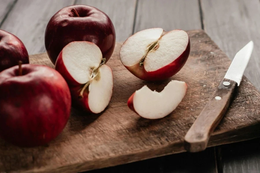 Photo of a Sliced Apple on a Chopping Board