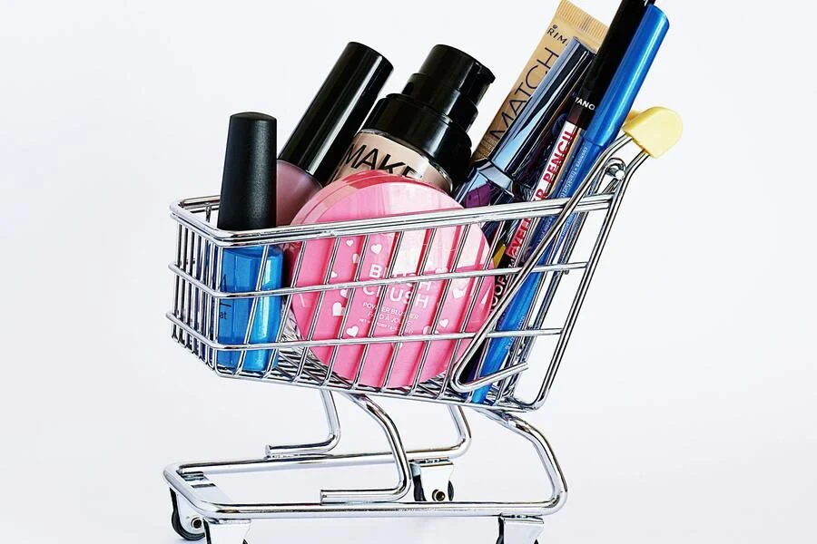 Shopping cart with assorted cosmetic products