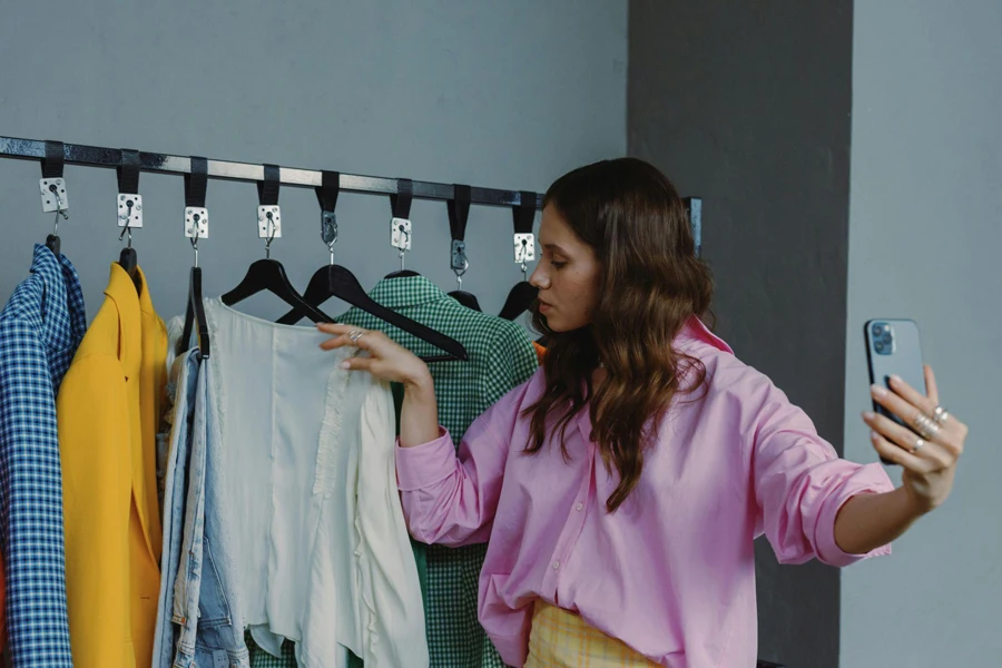 Store owner sharing a video online in her physical store