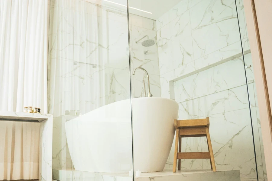 Teak bench next to tub and shower