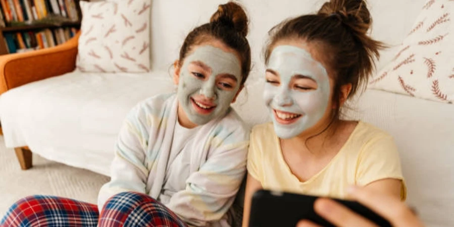 Teenage Girls Having Fun Taking Selfie with Mobile Phone