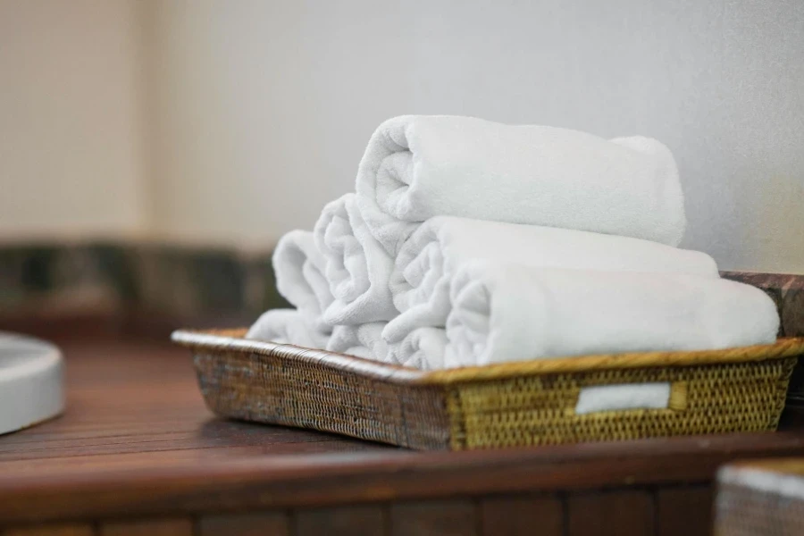 White Towel on Brown Woven Basket